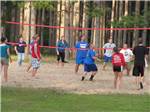View larger image of Campers playing volleyball at YUKON TRAILS CAMPGROUND image #3