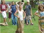 Group of kids in a potato sack race at FOUR SEASONS CAMPGROUNDS - thumbnail