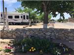 View larger image of A fifth wheel backed in at site at MISSION RV PARK image #5