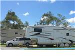 View larger image of Trailer in RV site at PARADISE ISLAND RV RESORT image #5