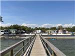 The wooden pier to the RV sites at NAVARRE BEACH CAMPING RESORT - thumbnail