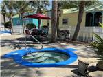 The hot tub in the swimming pool area at NAVARRE BEACH CAMPING RESORT - thumbnail