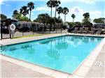 View larger image of The swimming pool area at COLONIA DEL REY RV PARK image #3