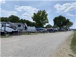 A row of trailers parked in gravel sites at MERAMEC CAMPGROUND - thumbnail