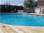 View larger image of Pool and lounge chairs at HIGH PLAINS CAMPING image #10