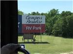 The front entrance sign at CAMPER'S PARADISE RV PARK - thumbnail