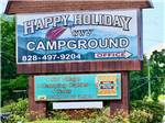 The front entrance sign at HAPPY HOLIDAY CAMPGROUND - thumbnail