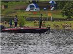View larger image of People fishing off of a boat at BONELLI BLUFFS RV RESORT  CAMPGROUND image #5