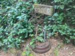 Fresh water faucet next to the trees at MYSTIC FOREST RV PARK - thumbnail