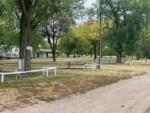 Sites with tables and white rails at PIONEER VILLAGE CAMPGROUND - thumbnail