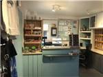 View larger image of Front desk with souvenirs displayed at CARIBOU RV PARK image #3