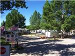 View larger image of Entrance to the RV park with trees at AB CAMPING RV PARK image #9