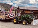 A group of people on a hay ride at ASPEN RIDGE RV PARK - thumbnail