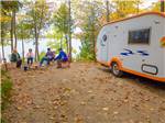 One of the RV sites by the water at SUMMER HOUSE PARK - thumbnail