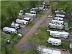 A variety of RVs parkded at sites - thumbnail