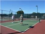 View larger image of A group of people playing pickleball at SUNDANCE RV RESORT image #4