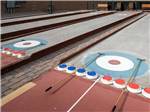A row of curling courts at SUNDANCE RV RESORT - thumbnail