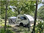 A small trailer in a RV site at ATLANTIC OAKS - thumbnail