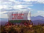 Old covered wagon at PRINCE OF TUCSON RV PARK - thumbnail