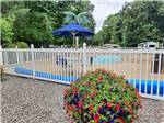 A close up of the swimming pool at The gravel road by the gazebo at HUNGRY HORSE FAMILY CAMPGROUND - thumbnail