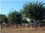 View larger image of Picnic tables and trailers camping at TOMBSTONE RV PARK image #2
