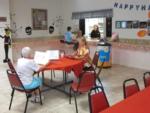 Interior eating area with tables and chairs at HAPPY TRAVELER RV RESORT - thumbnail