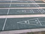 Outdoor shuffleboards at HAPPY TRAVELER RV RESORT - thumbnail