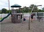 View larger image of Playground with swing set at MONUMENT RV RESORT image #7