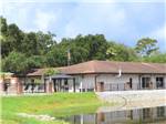View larger image of The main building by the water at SOUTHERN AIRE RV RESORT image #11