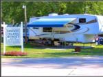 View of a RV site at Fantasy Island Campground - thumbnail