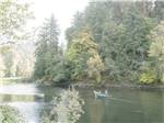 View larger image of People fishing from a boat at CAMP KALAMA RV PARK image #8