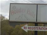 Another front sign with registration arrow at HOLIDAY HILLS RV PARK - thumbnail