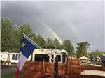 A double rainbow over the campsites at CAMPING PANORAMIC - thumbnail
