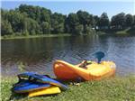 View larger image of An inflatable boat and life jackets on the lake at CAMPING DU VIEUX MOULIN image #9