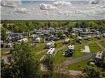 Aerial view of RVs on paved lots with green belts at CAMPING TRANSIT, ENR.205155 - thumbnail
