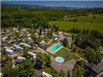 Aerial view of campground with pool and trees at CAMPING TRANSIT, ENR.205155 - thumbnail