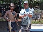 Two men holding fish they caught at VERO BEACH KAMP - thumbnail