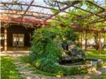 A fountain under an arbor - thumbnail