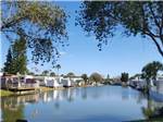 View larger image of Mobile homes along the waterway at SUNDANCE LAKES RV RESORT image #1