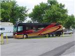 Class A motorhome in a pull thru site at LOUISVILLE NORTH CAMPGROUND - thumbnail