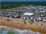 View larger image of People on the beach at BEVERLY BEACH CAMPTOWN RV RESORT  CAMPERS VILLAGE image #5