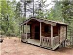 View larger image of The front porch to a rental cabin at BEECH HILL CAMPGROUND  CABINS image #10