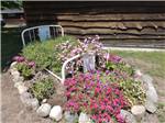 Rock lined flower bed at GLENVIEW COTTAGES & RV PARK - thumbnail