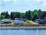 Some of the RV sites by the water at SEAVIEW CAMPGROUND & COTTAGES - thumbnail