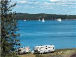 Sailboats with RVs in the foreground at SEAVIEW CAMPGROUND & COTTAGES - thumbnail