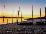 A ramp and large sticks on the beach at SEAVIEW CAMPGROUND & COTTAGES - thumbnail