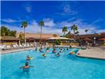View larger image of People swimming in the pool at VALLE DEL ORO RV RESORT image #1
