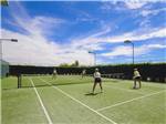 View larger image of Couples playing tennis at VALLE DEL ORO RV RESORT image #5