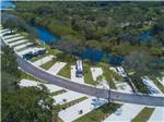 Aerial view over campground showing sites at BAY BAYOU RV RESORT - thumbnail