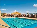 View larger image of Swimming pool with outdoor seating at VOYAGER RV RESORT  HOTEL image #1